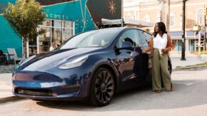 woman entering elecctric vehicle